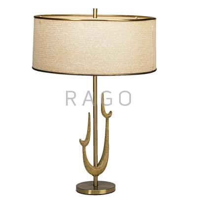 Appraisal: RIMBRANDT Table lamp with biomorphic sculptural base Brass-plated wood parchment