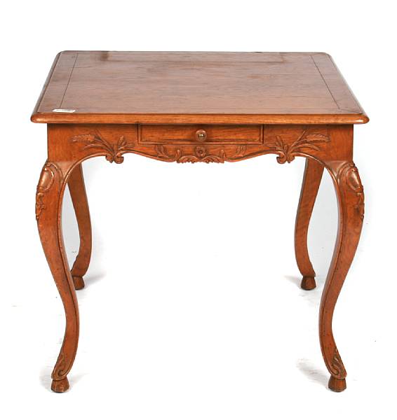 Appraisal: A Louis XV style carved oak center table height in