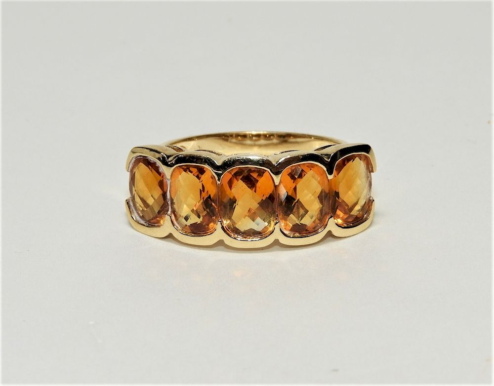 Appraisal: KT Yellow Gold Oval Citrine Lady's Ring th Century Five