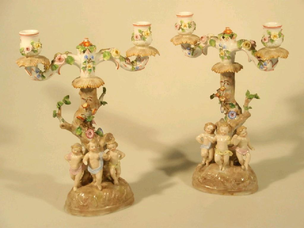 Appraisal: A pair of Ernst Bohn porcelain two-branch candelabra the branches