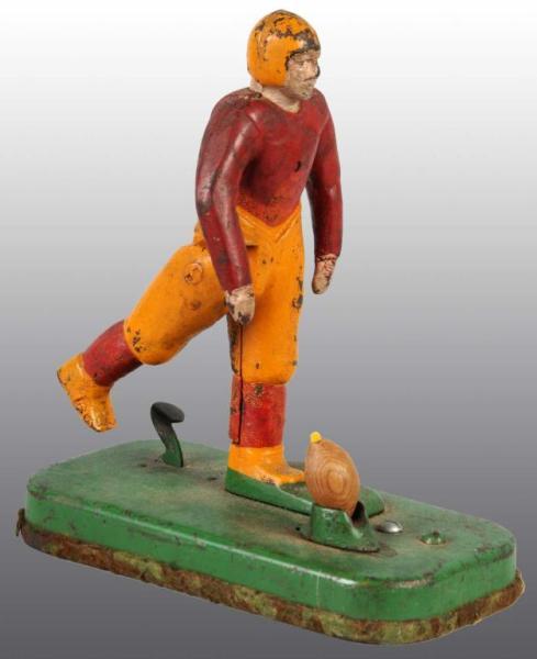 Appraisal: Cast Iron Mechanical Football Player Toy Description Working When right