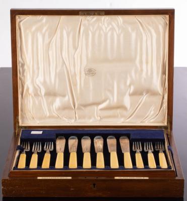 Appraisal: A set of twelve silver fish knives and forks with