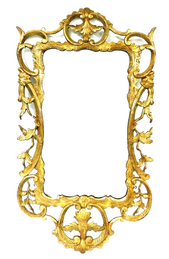 Appraisal: Rococo style wall mirror carved and pierced gilt wood frame