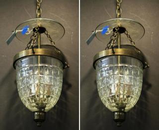 Appraisal: Pair of Colonial The unadorned smoke domes and cut glass