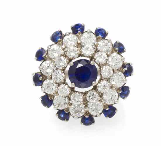 Appraisal: A Platinum Diamond and Sapphire Ring containing two round brilliant