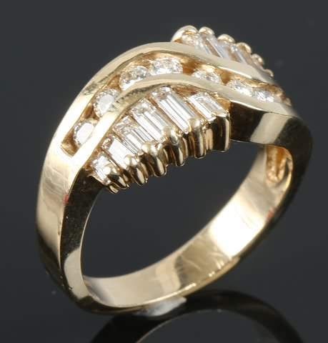 Appraisal: KY gold diamond free form ring stamped K round diamonds