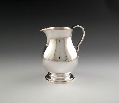 Appraisal: A modern silver jug by Wakely and Wheeler London plain