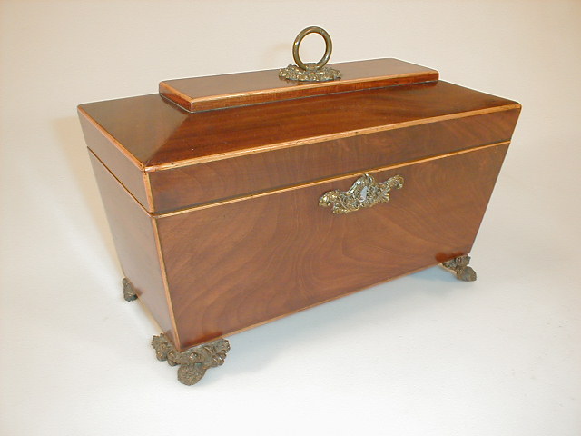 Appraisal: A Regency mahogany sarcophagus tea caddy with three part interior