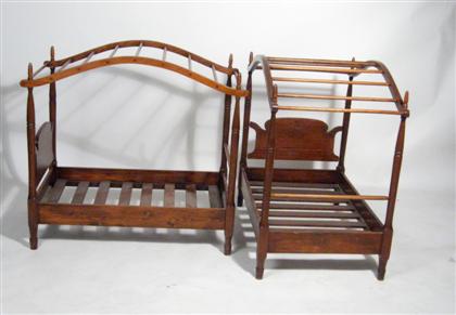 Appraisal: Two miniature canopy beds With bowed canopy on turned posts