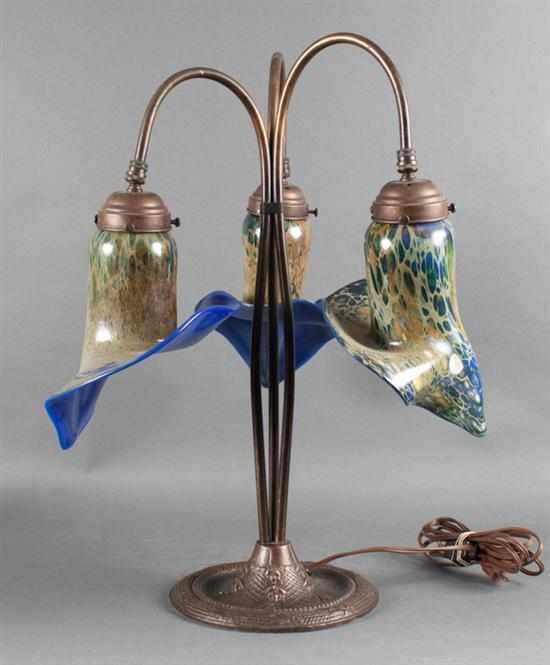 Appraisal: Tiffany style patinated metal and opalescent glass three-light lamp th