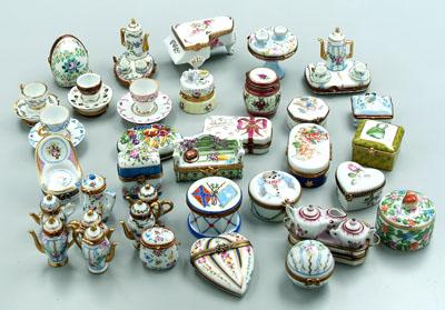 Appraisal: Limoges painted porcelain boxes painted on white tea sets teapots