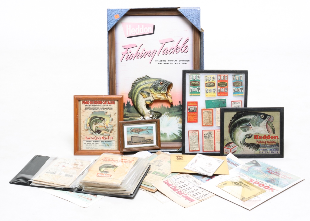 Appraisal: GROUPING OF FISHING ADVERTISING Twentieth century Includes Heddon catalog sign