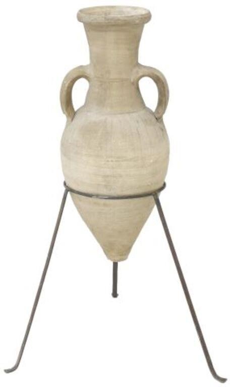 Appraisal: Large antique earthenware amphora on later iron stand attributed by