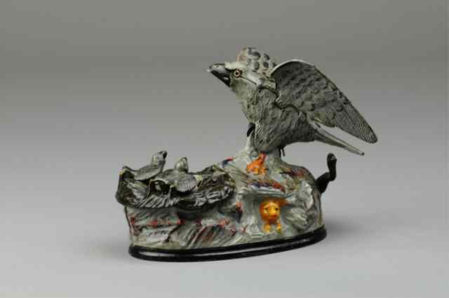 Appraisal: EAGLE EAGLETS MECHANICAL BANK Grey base J E Stevens Co