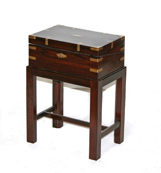 Appraisal: An English brass bound rosewood lap desk on later stand