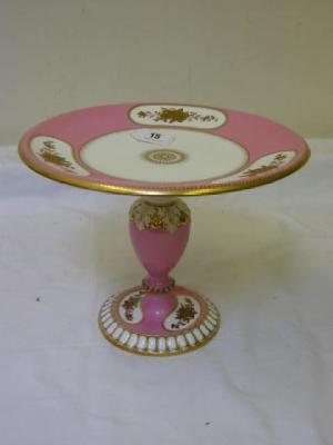 Appraisal: A VICTORIAN PORCELAIN PEDESTAL TAZZA with three kidney shaped panels