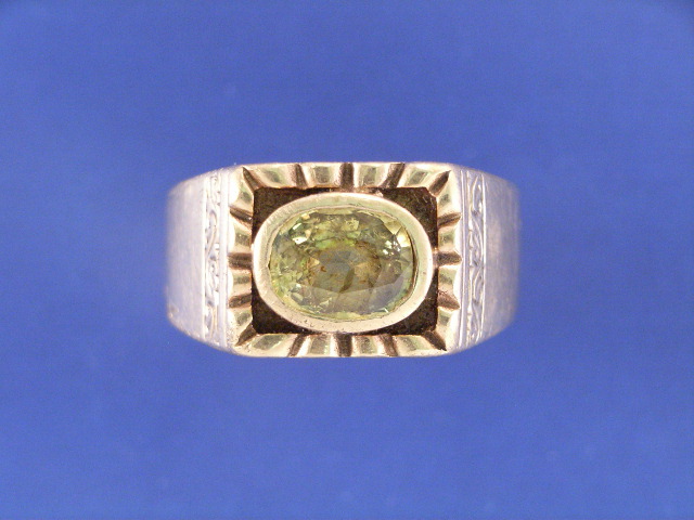 Appraisal: A ct gold estimated ct yellow sapphire signet ring ring