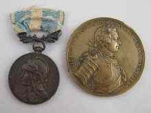 Appraisal: A bronze medal the obverse Frederic the Great the reverse