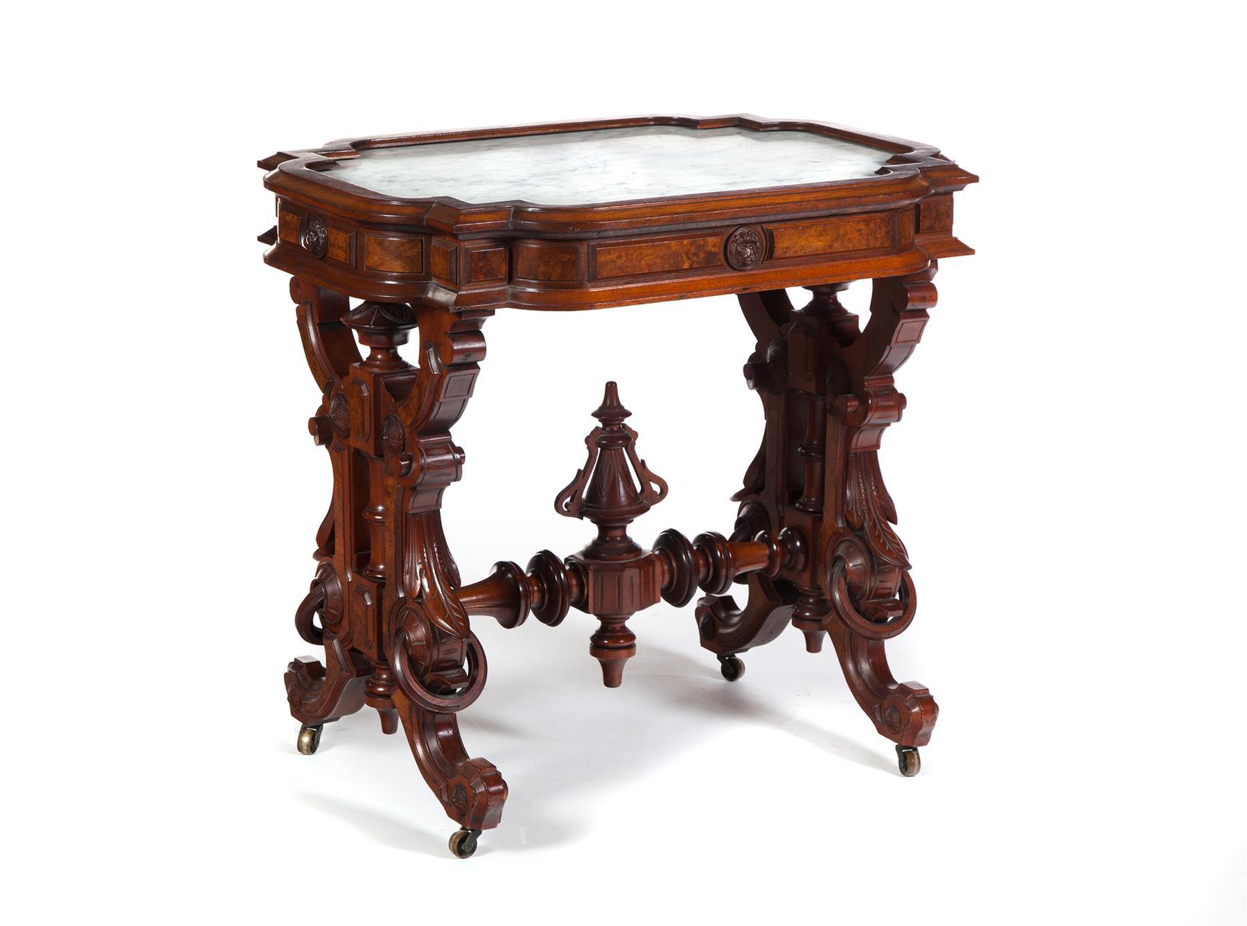 Appraisal: HEAVILY CARVED VICTORIAN MARBLE TOP PARLOR TABLE American nd half-