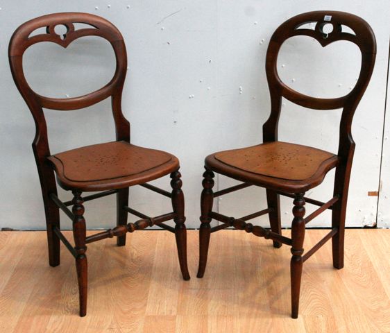 Appraisal: A pair of late th century stained beech balloon-back occasional