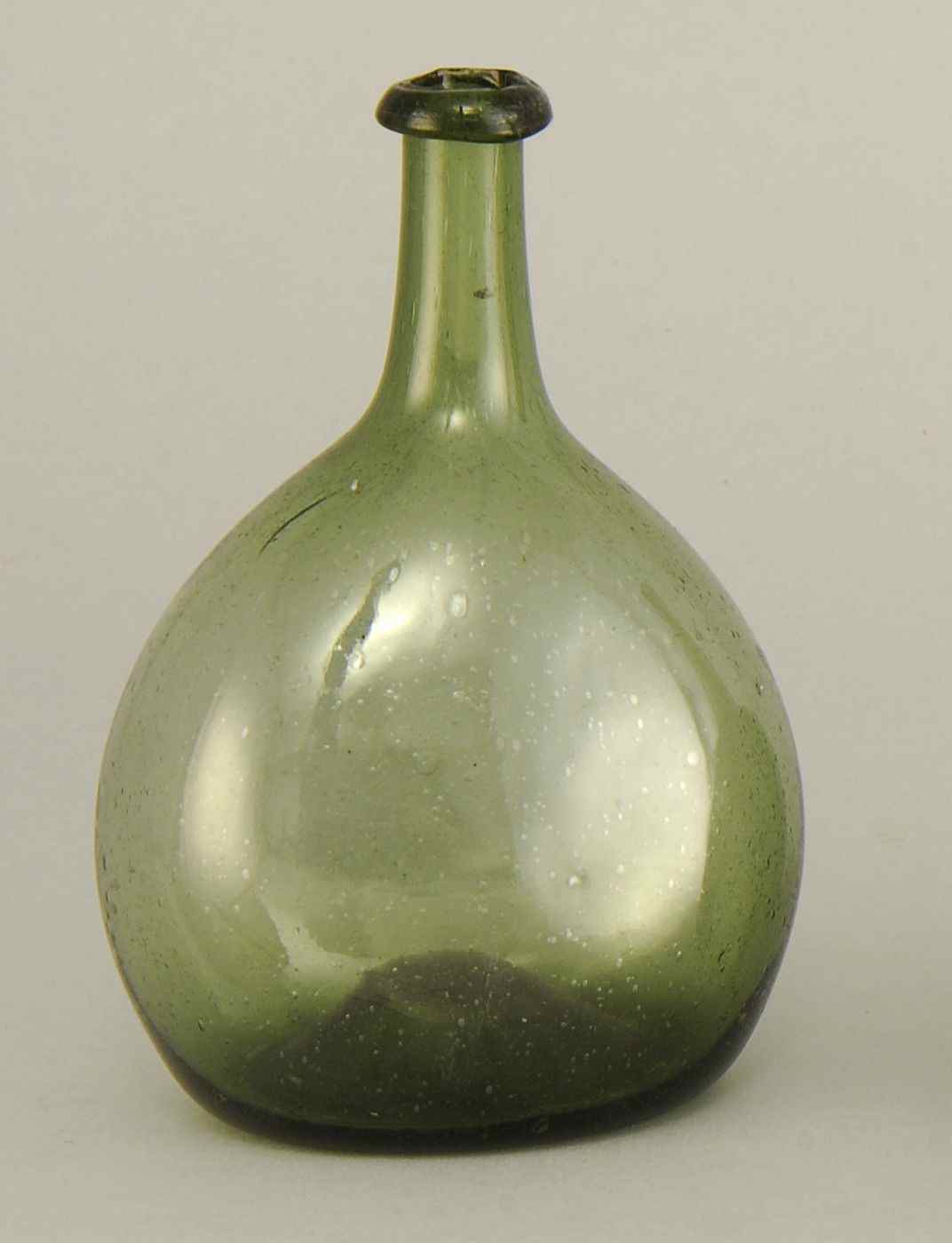 Appraisal: LIGHT GREEN BLOWN GLASS CHESTNUT FLASKLate th Early th CenturyWith