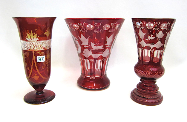 Appraisal: BOHEMIAN RUBY RED GLASS VASES three pieces flashed and engraved