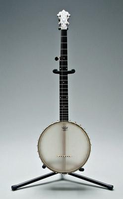 Appraisal: S S Stewart five string banjo Thoroughbred mother-of-pearl inlaid head