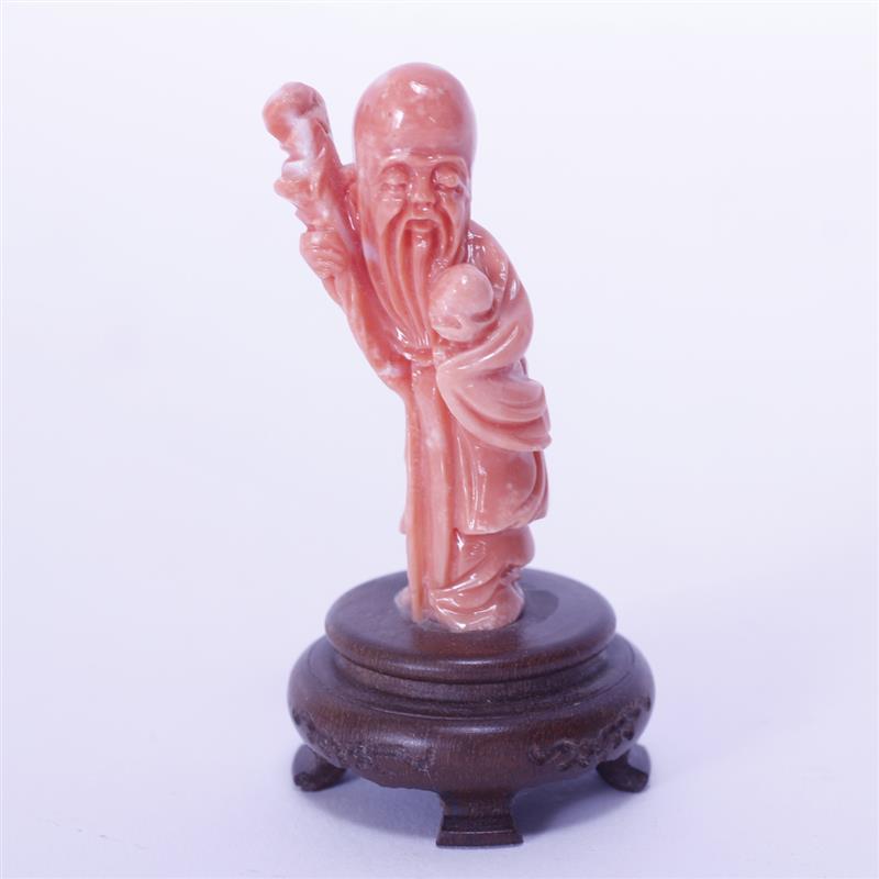 Appraisal: Chinese Carved Coral Immortal figure attached on wooden base H