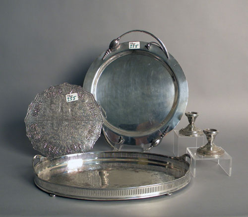 Appraisal: Five silver plated trays together with a pair of weighted