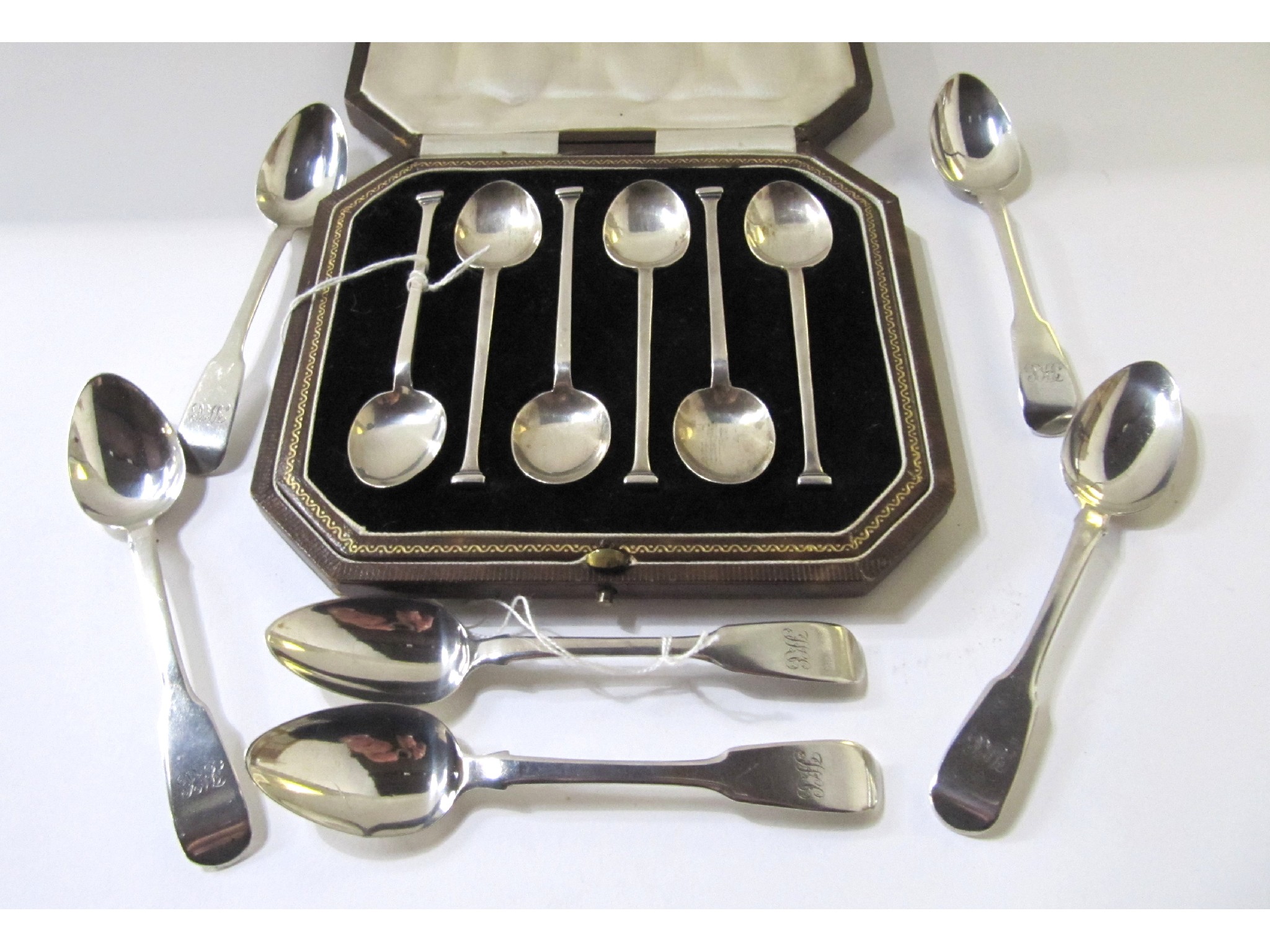 Appraisal: A lot comprising a cased set of silver teaspoons Sheffield