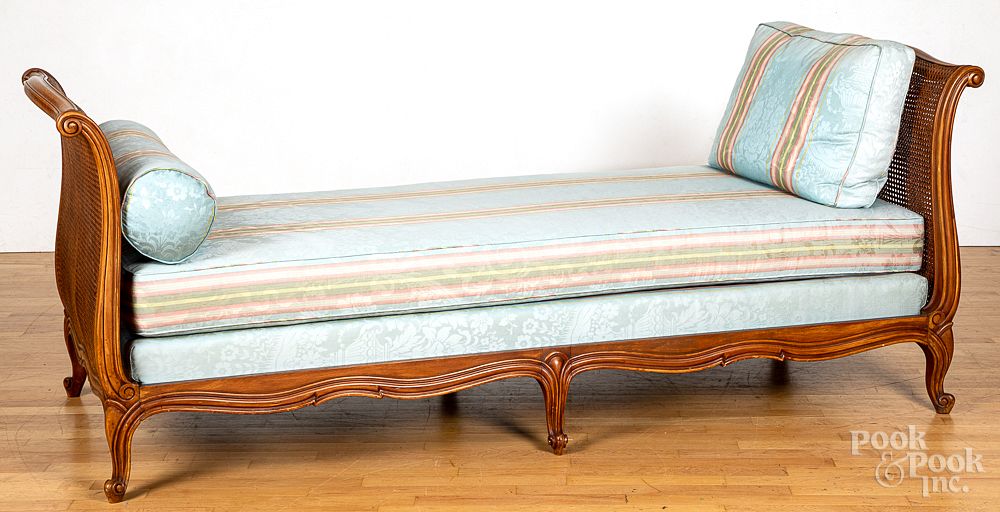 Appraisal: Mahogany and rattan daybed with silk upholstery Mahogany and rattan