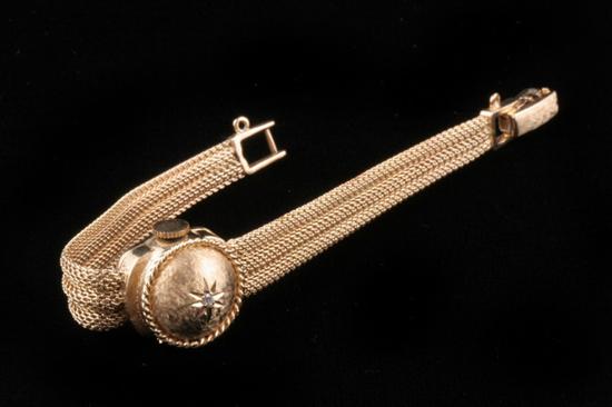 Appraisal: LADIES K YELLOW GOLD AND DIAMOND BRACELET WATCH By Zimmer