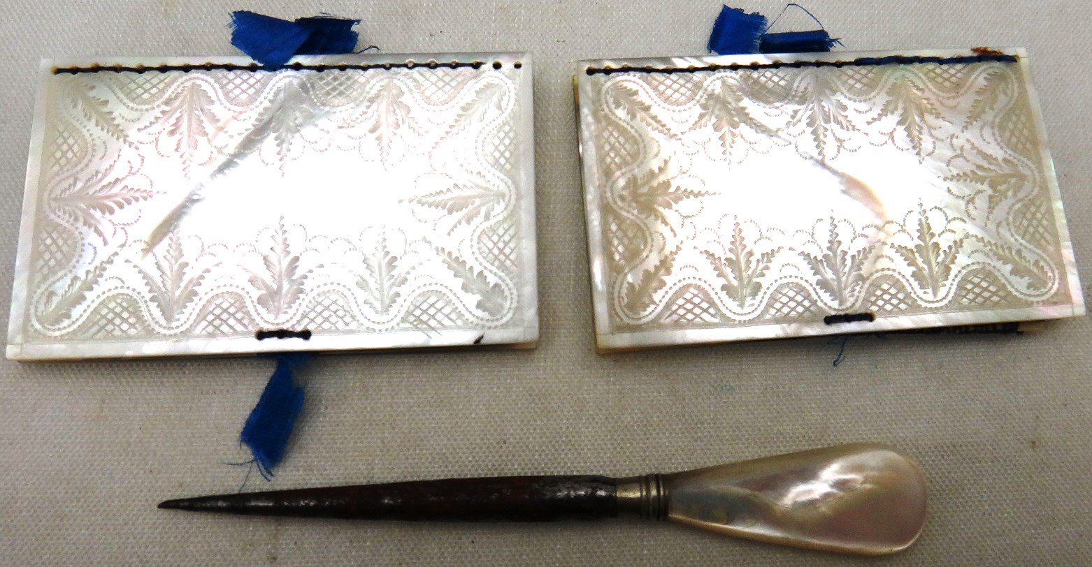 Appraisal: Two Victorian rectangular mother of pearl needle cases the covers