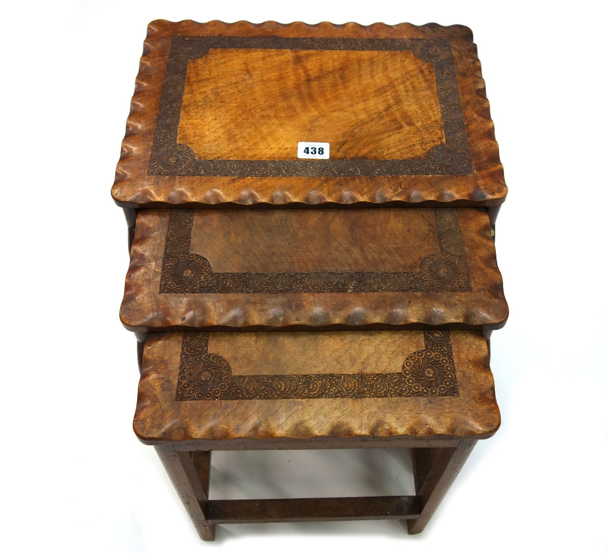 Appraisal: An Indian carved hardwood nest of three tables the largest