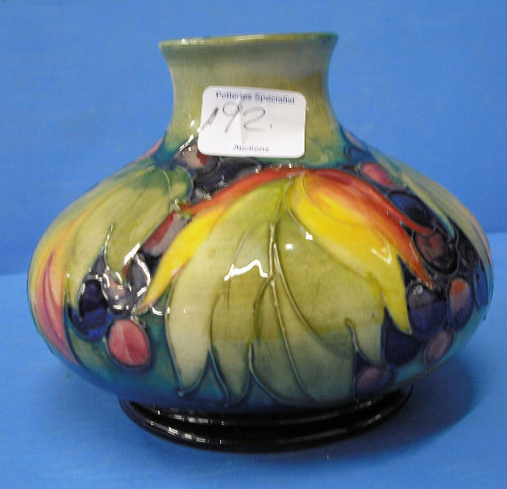 Appraisal: Moorcroft squatt Vase decorated in the Leaf and Berry design