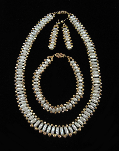 Appraisal: FOUR PIECE PEARL JEWELRY SET including a inch necklace a