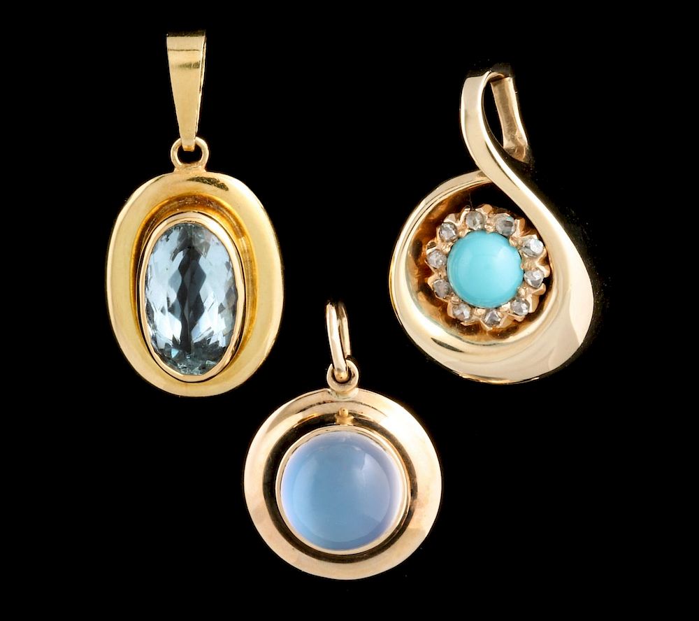 Appraisal: THREE K GOLD PENDANTS WITH GEMSTONES Three small k yellow