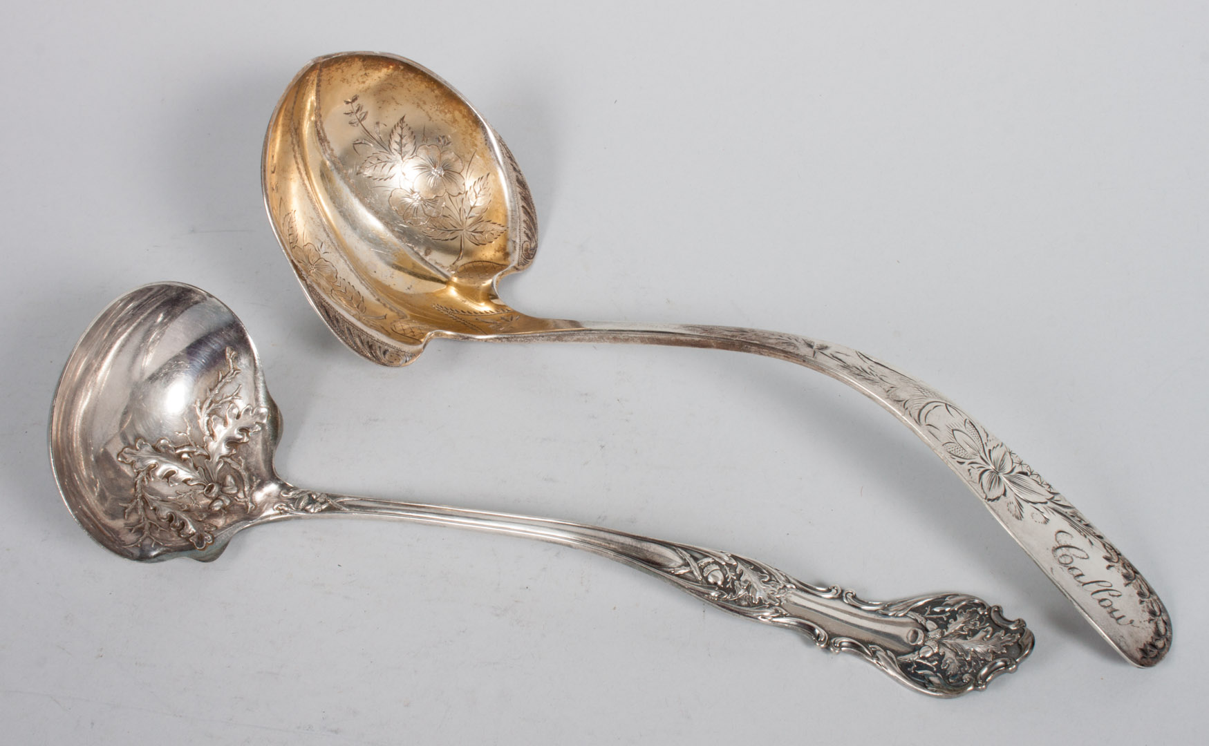 Appraisal: Hennegen Bates Co engraved sterling soup ladle ozt together with