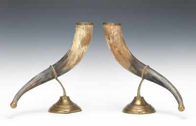 Appraisal: A Pair of Natural Horn and Brass Ornaments The horns