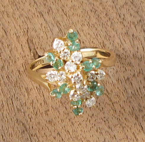 Appraisal: EMERALD DIAMOND AND YELLOW GOLD RING The k gold ring