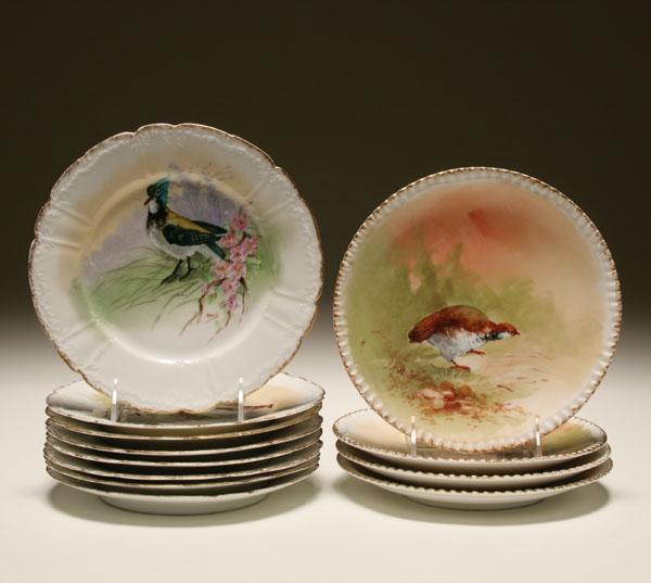 Appraisal: Limoges porcelain set of four plates with hand painted bird