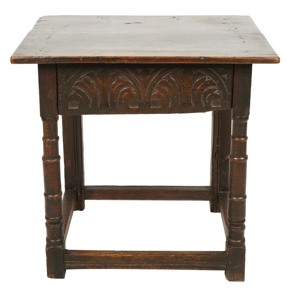 Appraisal: GEORGIAN CARVED OAK TAVERN TABLE th century with carved frieze