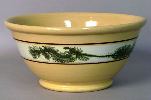 Appraisal: Large yelloware mixing bowl with seaweed decoration h dia