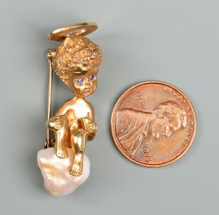 Appraisal: Ruser K yellow gold cherub pin with pearl k yellow