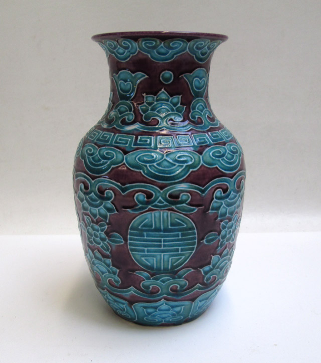 Appraisal: CHINESE CERAMIC VASE Early th century having raised turquoise motif