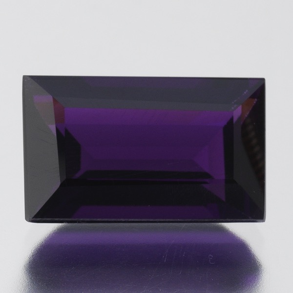 Appraisal: UNMOUNTED RECTANGULAR STEP CUT AMETHYST mm x mm x mm