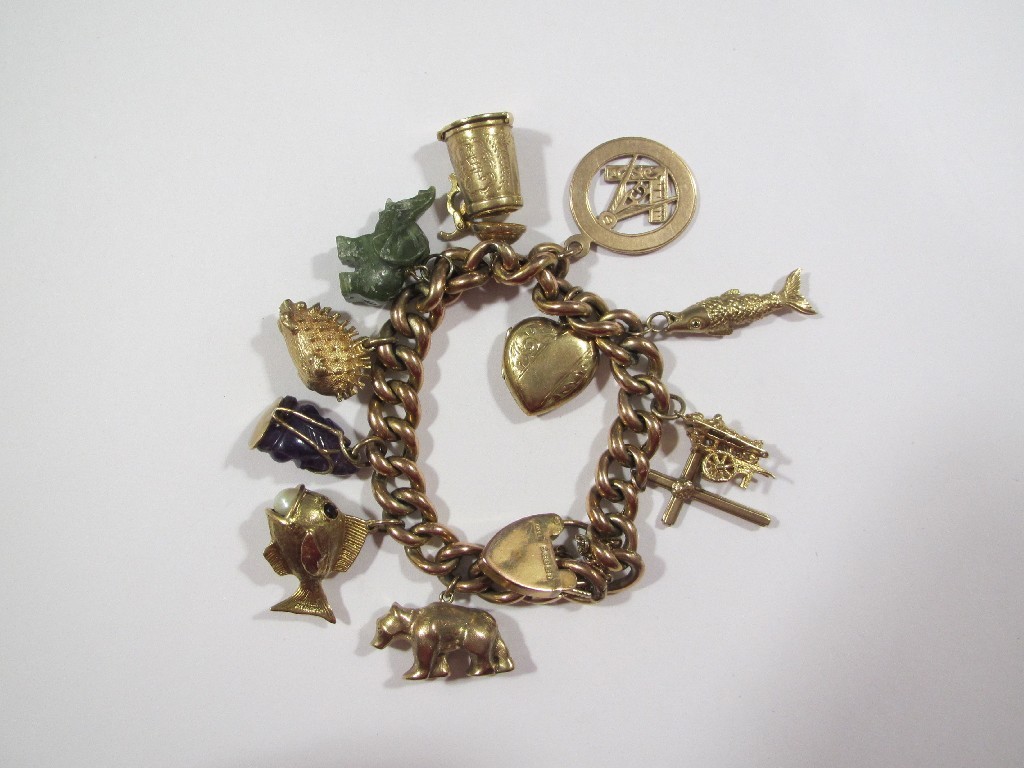 Appraisal: Nine carat gold charm bracelet with various gold charms a