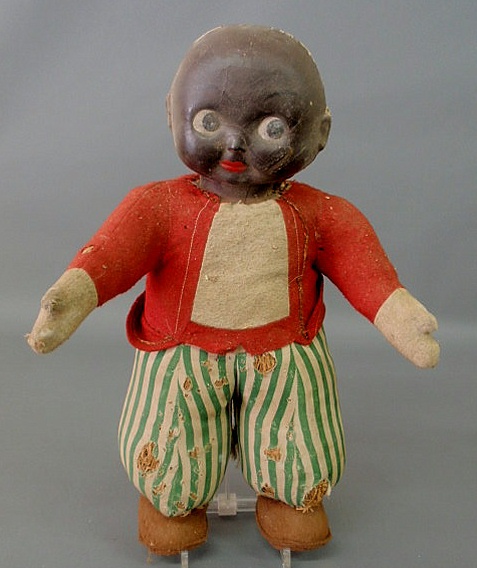 Appraisal: American black folk art doll with straw stuffing and stitched