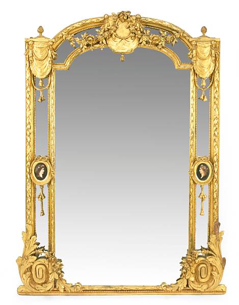 Appraisal: A Napoleon III porcelain mounted carved giltwood and gesso mirror