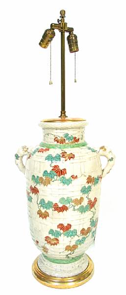 Appraisal: A Japanese earthenware vase now mounted as a lamp height